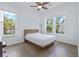 Sun-filled bedroom with hardwood floors, large windows, and modern design offers a relaxing space at 840 Forrest Dr, Charleston, SC 29492