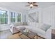 Bright living room showcasing a large sectional sofa, a coffee table, and plenty of natural light at 840 Forrest Dr, Charleston, SC 29492