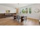 Charming dining room featuring a wood dining table with views of the outdoors at 1012 E Erie Ave, Folly Beach, SC 29439