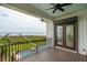 Scenic balcony view of a pool and waterfront with private pier access at 104 Beach St, Mount Pleasant, SC 29464