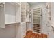 Spacious walk-in closet with custom shelving and storage at 104 Beach St, Mount Pleasant, SC 29464