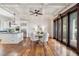 Inviting dining area adjacent to the kitchen, boasting natural light and access to an outdoor space at 104 Beach St, Mount Pleasant, SC 29464