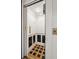 A unique elevator with black and wood paneling offers easy access between floors at 104 Beach St, Mount Pleasant, SC 29464