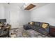 Comfortable living area with a gray couch, desk and door leading outside at 106 Brown Ct, Summerville, SC 29486