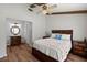 Bedroom with wooden beams, ceiling fan, decorative pillow, and an ensuite bathroom at 106 Brown Ct, Summerville, SC 29486