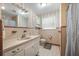 Retro-style bathroom with pink tile, vanity, and shower/tub combination, offering a vintage aesthetic at 1115 O T Wallace Blvd, Moncks Corner, SC 29461