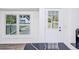 Interior door and window view of the backyard deck and landscaping at 132 Tranquil Ln, Ladson, SC 29456