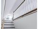 Stairway features wood steps and white railings at 132 Tranquil Ln, Ladson, SC 29456