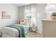 Bright bedroom featuring a cozy twin bed, soft lighting and calming decor, perfect for relaxation at 133 Haventree Ct, Summerville, SC 29486