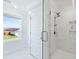 Bright bathroom featuring a glass-enclosed shower with dual showerheads and marble accents at 133 Headwater Dr, Summerville, SC 29486