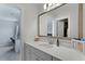 Modern bathroom with a large mirror, white countertops, and stylish fixtures at 133 Headwater Dr, Summerville, SC 29486