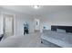 Inviting bedroom with neutral carpet and decor, adjacent to a bright bathroom and closet at 133 Headwater Dr, Summerville, SC 29486