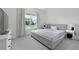 Comfortable bedroom with soft gray carpeting and a window providing natural light at 133 Headwater Dr, Summerville, SC 29486