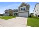 Two story home with a two car garage and a concrete driveway at 133 Headwater Dr, Summerville, SC 29486