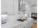 Well-lit kitchen with white cabinets, subway tile backsplash, and stainless steel appliances at 133 Headwater Dr, Summerville, SC 29486