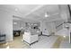 Open-concept living space with a clear view of the kitchen and dining area, featuring modern furniture and lighting at 133 Headwater Dr, Summerville, SC 29486