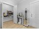 Spacious pantry with well-organized shelving, a mirrored wall, and a sleek robot vacuum at 133 Headwater Dr, Summerville, SC 29486