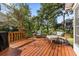 Relaxing outdoor deck area with wood flooring and comfortable patio furniture at 1330 Somersby Ln, Mount Pleasant, SC 29466