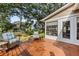 Charming back porch featuring wood flooring and comfortable seating area at 1330 Somersby Ln, Mount Pleasant, SC 29466