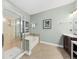 Luxurious bathroom with a separate shower, soaking tub, and elegant vanity at 1330 Somersby Ln, Mount Pleasant, SC 29466
