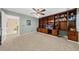 Bedroom with carpet and a large wood built-in wall unit with shelving at 1330 Somersby Ln, Mount Pleasant, SC 29466