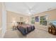 Bedroom with neutral carpet, two large windows, and a ceiling fan at 1330 Somersby Ln, Mount Pleasant, SC 29466