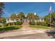 Beautiful clubhouse with lush green trees, stairs, and manicured landscaping at 1330 Somersby Ln, Mount Pleasant, SC 29466