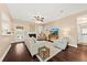Cozy living room with a fireplace, comfortable seating, and natural light at 1330 Somersby Ln, Mount Pleasant, SC 29466