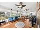 Bright sunroom with lots of natural light and multiple ceiling fans at 1330 Somersby Ln, Mount Pleasant, SC 29466