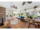 Bright sunroom featuring lots of natural light and wood look flooring at 1330 Somersby Ln, Mount Pleasant, SC 29466