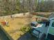 Spacious backyard featuring an enclosed fence, a built-in grill, and ample yard space at 136 Stagecoach Ln, Summerville, SC 29483