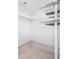 Walk-in closet with ample shelving, providing organized storage solutions, and a neutral color scheme at 136 Stagecoach Ln, Summerville, SC 29483