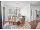 Dining room with round table, chairs, and natural light from the windows at 136 Stagecoach Ln, Summerville, SC 29483
