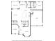 Detailed first floor floor plan showcasing the layout of the kitchen, living room, and garage at 136 Stagecoach Ln, Summerville, SC 29483