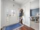 Elegant foyer with hardwood floors, decorative front door, and an open view to the living area at 136 Stagecoach Ln, Summerville, SC 29483