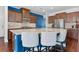 Kitchen with a large island featuring granite countertops and stainless steel appliances at 136 Stagecoach Ln, Summerville, SC 29483