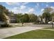 Beautiful residential neighborhood with well-maintained homes and lush green landscaping along a circular street at 136 Stagecoach Ln, Summerville, SC 29483