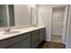 Elegant bathroom with dual sinks, modern cabinets, and spacious countertops at 137 Haventree Ct, Summerville, SC 29486