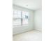 This bedroom has a large window with blinds and neutral carpet at 137 Haventree Ct, Summerville, SC 29486