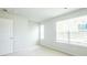 This bedroom has two large windows with blinds and neutral carpet at 137 Haventree Ct, Summerville, SC 29486