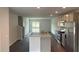 Open-concept kitchen seamlessly connects to the living area, providing a versatile space for dining and entertaining at 137 Haventree Ct, Summerville, SC 29486