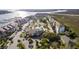 Extensive aerial view of the condominium complex, showcasing its waterfront location and community features at 138 W Mariners Cay Dr, Folly Beach, SC 29439