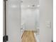 Bright bathroom featuring a glass shower, light hardwood floors, and modern fixtures at 14 F St # B, Charleston, SC 29403
