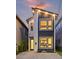 Striking modern home exterior with mixed siding, expansive windows, and minimalist landscaping at 14 F St # B, Charleston, SC 29403