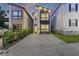 Contemporary home showcasing a stylish facade, prominent windows, and a spacious driveway at 14 F St # B, Charleston, SC 29403