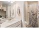 Bathroom featuring a white vanity, mirror, and a shower with a decorative shower curtain at 1402 Camp Rd # 9G, Charleston, SC 29412