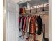 Organized closet with shelves, hanging rods, and storage bins for efficient clothing and item storage at 1402 Camp Rd # 9G, Charleston, SC 29412
