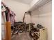 Bright walk-in closet with shelves, hanging racks, and space for organizing clothes and shoes at 1402 Camp Rd # 9G, Charleston, SC 29412