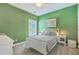 Comfortable bedroom featuring neutral carpet and a window at 1408 Bimini Dr, Charleston, SC 29414
