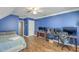 Bright bedroom featuring multiple computer monitors and natural wooden floors at 1408 Bimini Dr, Charleston, SC 29414